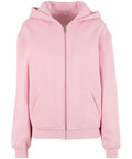 A light pink zip-up hoodie with a front zip, hood, ribbed cuffs and hem, plus two front pockets, shown against a plain white background.
