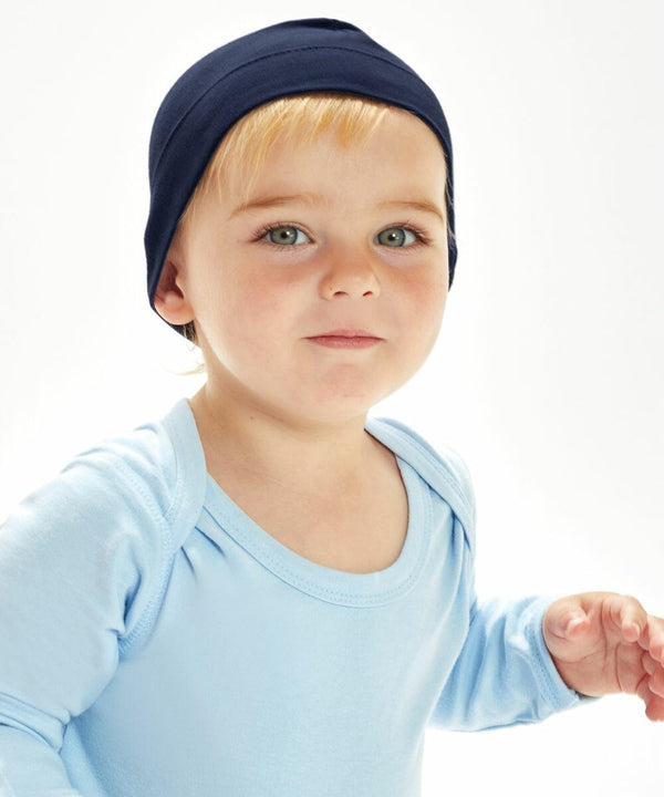 A young child with blonde hair wears a dark blue Babybugz BZ062 hat and a light blue shirt, looking at the camera.
