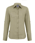 A light olive green button-up shirt, model CR541 by Craghoppers, featuring a single chest pocket and long sleeves. Displayed on a plain background, the shirt includes a classic collar and button cuffs.