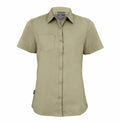 Craghoppers CR543, an olive green short-sleeve button-up shirt featuring a single chest pocket, is displayed on a white background.