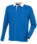 The FR104 shirt from Front Row is a blue rugby shirt featuring long sleeves, a white collar, and a button placket. It includes ribbed cuffs and offers a slightly loose fit.