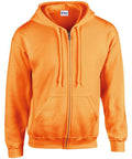The GD058 hoodie by Gildan is bright orange and features a front zipper, two pockets, a drawstring hood, and a label at the neck. It is displayed against a white background.