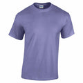 A plain, short-sleeved T-shirt from Gildan, product GD05B, in a lavender hue with a round neckline is displayed against a white background. The soft and smooth fabric gives it the perfect casual wear appeal.