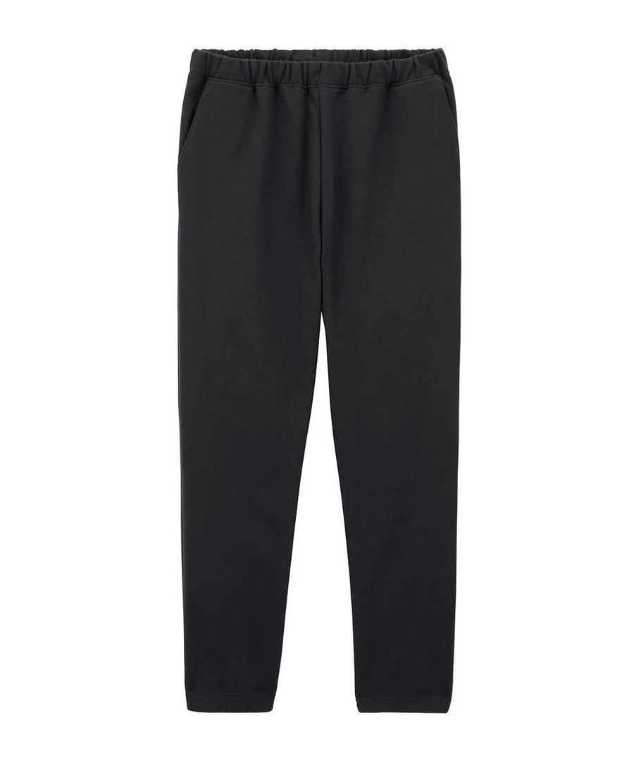 Sweatpants shown on a white background feature a black colour, elasticated waistband, side pockets, and a straight leg cut with a minimalist design.