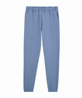 Light blue joggers featuring an elasticated waistband, side pockets, and elasticated ankle cuffs, shown on a plain white background.