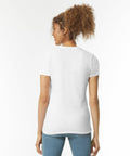 A person with curly hair is shown from behind, wearing a white short-sleeve GD072 shirt by Gildan and blue jeans, against a plain white background.