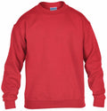 A Gildan GD56B sweatshirt in plain red with long sleeves, displayed on a white background.