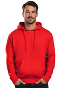 A person is wearing a bright red Uneek Eco Hoodie with their hands in the front pocket. The sweatshirt, features a drawstring hood and long sleeves. The background is plain white.