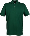The Henbury HB101 is a plain dark green polo shirt featuring short sleeves and a three-button placket.