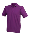Henbury HB400 is a purple polo shirt featuring short sleeves, a buttoned collar, and a plain design against a white background.