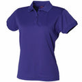 A Henbury HB476 polo shirt in plain purple, featuring short sleeves, a collar, and buttons, displayed on a white background.