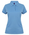 The HB476 by Henbury is a light blue women's polo shirt featuring short sleeves and a collar. It has three buttons down the front and is showcased against a plain white background.