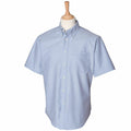 HB515 by Henbury displayed on a mannequin torso with a wooden neck stand, featuring a light blue short-sleeve button-up design.
