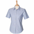 Henbury's HB516 light blue short-sleeve shirt is showcased on a mannequin with a wooden stand.