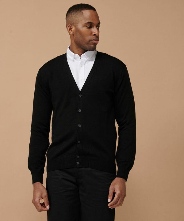 A person wearing a black Henbury HB722 button-up cardigan over a white collared shirt, standing against a plain beige background and looking to their right.