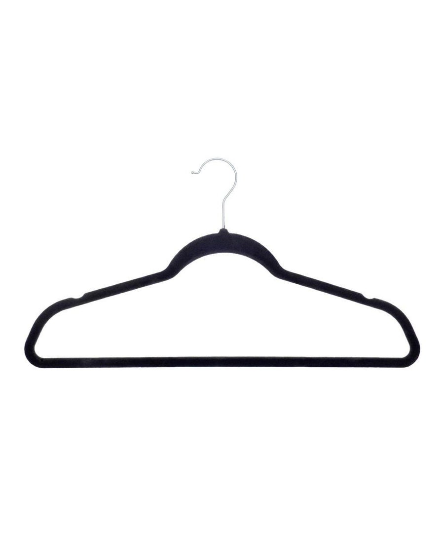 A single Accessories black velvet hanger with a metal hook is displayed against a plain white background.