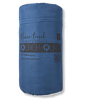 A rolled-up blue package labelled "Blankets," featuring dimensions of 135 x 200 cm, is described as a plush combi quilt/throw. The package includes a barcode and printed text.