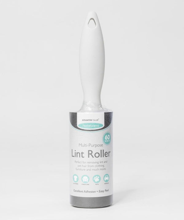 The Home & Living Lint Roller with a plastic handle stands upright on a white background. Its label reads "Multi-Purpose Lint Roller," notes it has 60 sheets, and highlights its effectiveness for removing lint and pet hair.