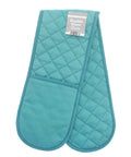 The gloves are teal, quilted double oven gloves with a label reading "Double Oven Glove." Each end features a pocket, and the design includes a diamond stitch pattern.