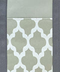 A close-up view of the beautifully designed pocket on the HL203 by Home & Living, featuring a light green and white geometric pattern, elegantly bordered by gray material on the sides.