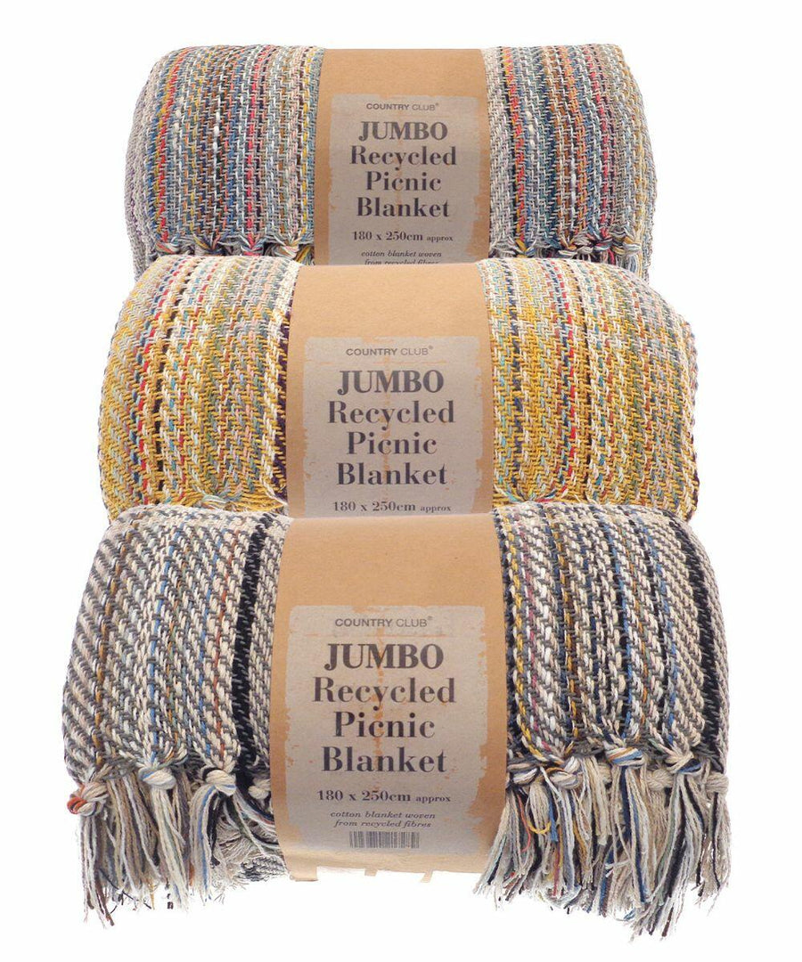 Three rolled jumbo recycled picnic blankets from the brand Home & Living, each featuring various multicolored patterns and fringed edges, labeled with product name HL207 and dimensions of 180 x 250cm.