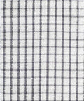 Detailed view of Home & Living's HL214 fabric, featuring a gray and white plaid design with a mix of dark and light checkered patterns.