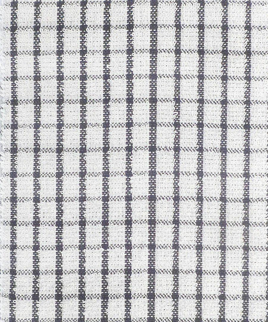 Detailed view of Home & Living's HL214 fabric, featuring a gray and white plaid design with a mix of dark and light checkered patterns.