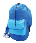 A large blue Bags drawstring rucksack with a light blue front pocket is displayed next to blue canvas high-top trainers with white laces and soles on a plain white background.