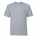 A plain light gray T-shirt with short sleeves and a crew neck, displayed against a white backdrop, exemplifies the Russell brand's J010M. The fabric looks soft with a slightly heathered texture, offering a casual and comfortable appearance.