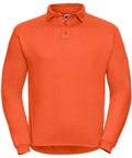 The J012M by Russell is an orange long-sleeve polo shirt featuring a collar and three buttons. It boasts a solid color with a simple, casual design.