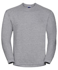 The J013M by Russell is a plain gray sweatshirt featuring long sleeves and a round neckline, set against a white background. The fabric looks soft and subtly textured, making it perfect for casual wear.