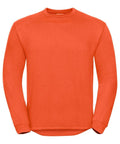 An orange long-sleeve sweatshirt from Russell, model J013M, with a crew neckline is featured on a plain white background. The sweatshirt boasts a simple and casual design, making it ideal for everyday wear.