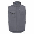 The Russell J014M is a gray vest featuring a high collar, multiple pockets, and a front zipper closure.