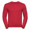 Product J262M from Russell is a simple red crewneck sweatshirt with long sleeves, shown on a white backdrop. The material looks soft and comfortable, making it ideal for everyday wear.