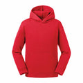 A Russell J265B hoodie in a striking red color, featuring a front pocket and long sleeves, is showcased against a white background. The hood is raised, highlighting the garment's soft and comfortable fabric.