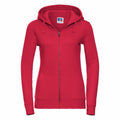 Introducing the Russell J266F: a stylish red zip-up hoodie featuring a hood with drawstrings. It includes a full-length zipper on the front and two convenient pockets, beautifully showcased against a crisp white background.