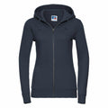 A dark green J266F hoodie from Russell features a zip-up design with a hood and two front pockets. The Russell brand logo is visible on the tag sewn at the neckline, and the hoodie is styled with long sleeves and a fitted design.
