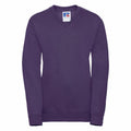 The product, J272B, is a plain purple sweatshirt from Russell featuring a V-neck collar and long sleeves. Its fabric looks soft and comfortable. A small tag with the Russell brand logo is located at the neckline.