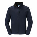 A navy blue Russell J420M softshell zip-up jacket featuring a high collar.