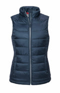 Russell's J441F features a navy blue puffer vest with a high collar and a front zipper closure.