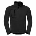 The J520M jacket by Russell features a high collar and multiple zippered pockets, including ones on the chest and sleeve.