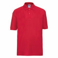Russell's J539B short-sleeve polo shirt in red, featuring a collar and button placket, is showcased against a plain white background.