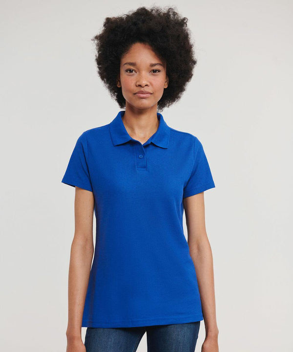 Person with a neutral expression wearing a blue polo shirt and jeans, standing against a plain background, dressed in the Russell J539F.