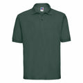 The J539M from Russell is a dark green polo shirt featuring short sleeves, a collar, and a small logo on the left side of the chest.