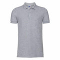 The Russell J566M is a grey short-sleeve polo shirt featuring a buttoned collar and crafted from soft fabric. Its straightforward design makes it ideal for both casual and semi-formal settings. Displayed against a plain white background, this shirt emphasizes its simplicity and versatility.