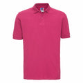 A vibrant pink Russell polo shirt, model J569M, featuring a collar and short sleeves, displayed against a white background.