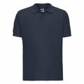 A plain, dark blue short-sleeve polo shirt from Russell, featuring a collar and three buttons along the placket. Product Name: J577M.