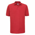 J599M by Russell, a red short-sleeve polo shirt displayed against a white background.