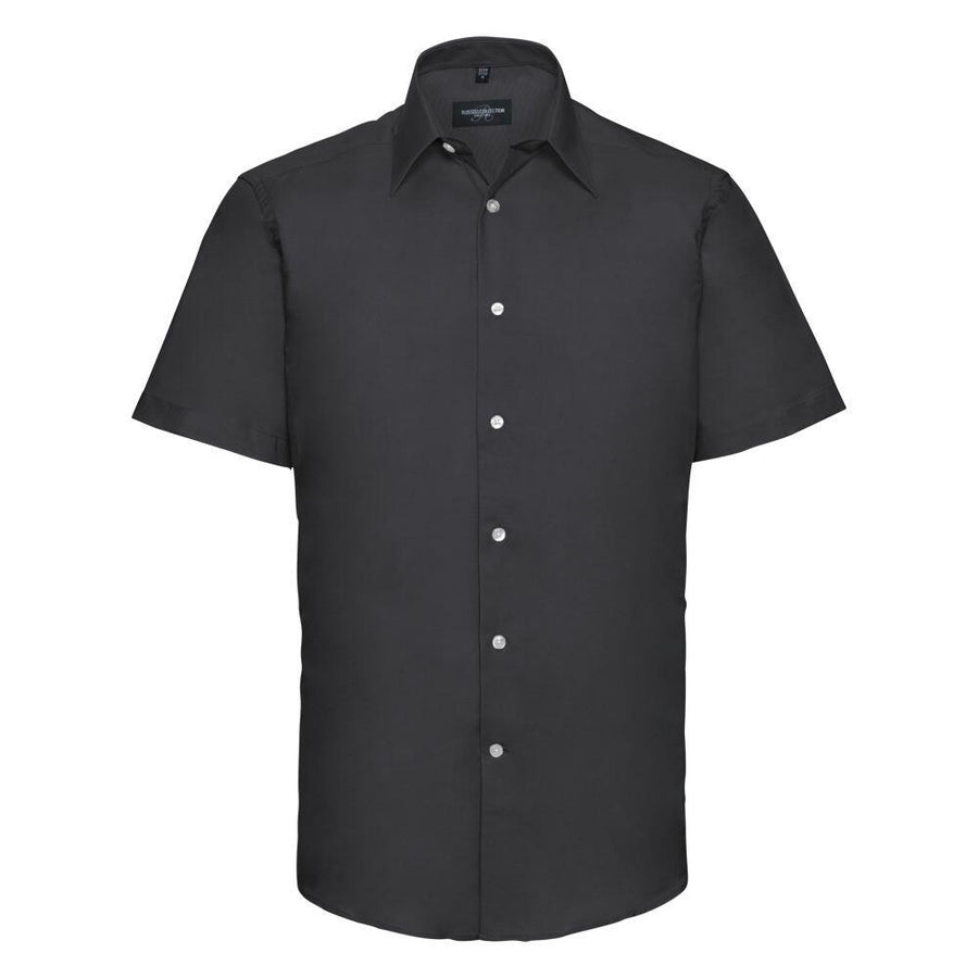 Russell Collection's J923M, a black short-sleeve button-up shirt with white buttons, is displayed against a plain background.