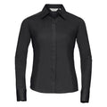 Russell Collection's J924F, a black long-sleeve button-up shirt featuring a pointed collar, is displayed against a white background.